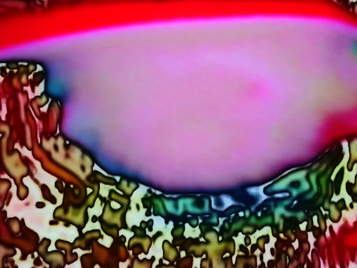 Still from the video: PSYCHOCHROMATIC