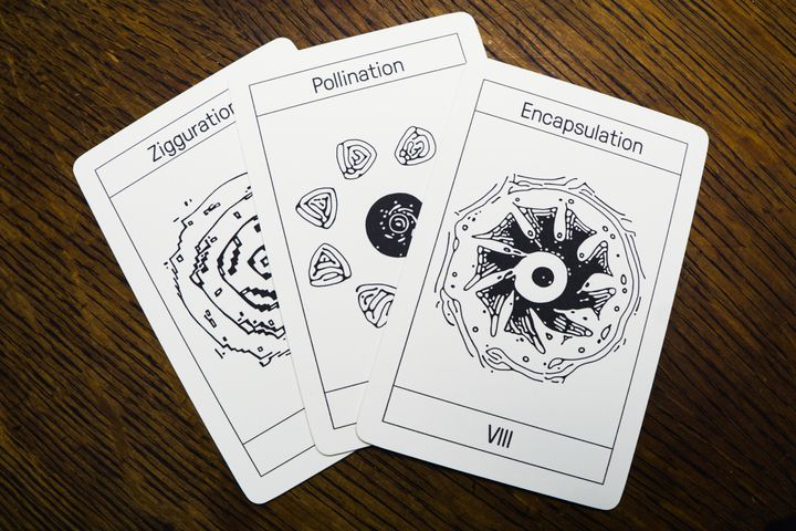 3 cards spread out in a fan shape