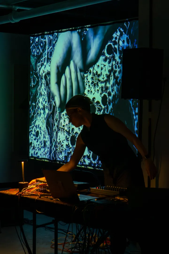 Paula silhouetted by Tom Snelgrove's film