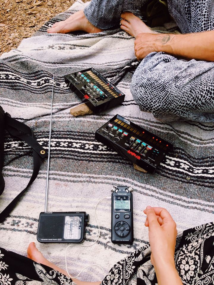 Portable music equipment on a picnic blanket