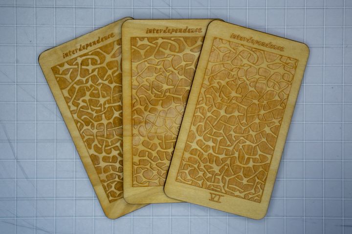 3 wooden tarot cards
