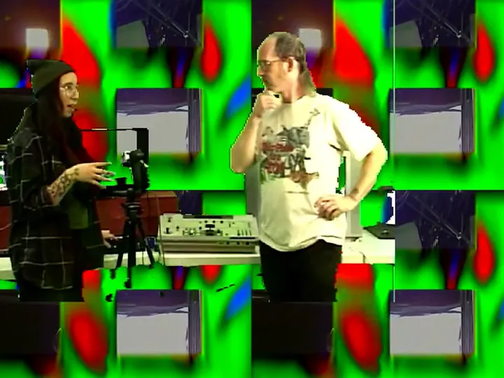 Paloma and Andrei looking thoughtful in front of melting blobs